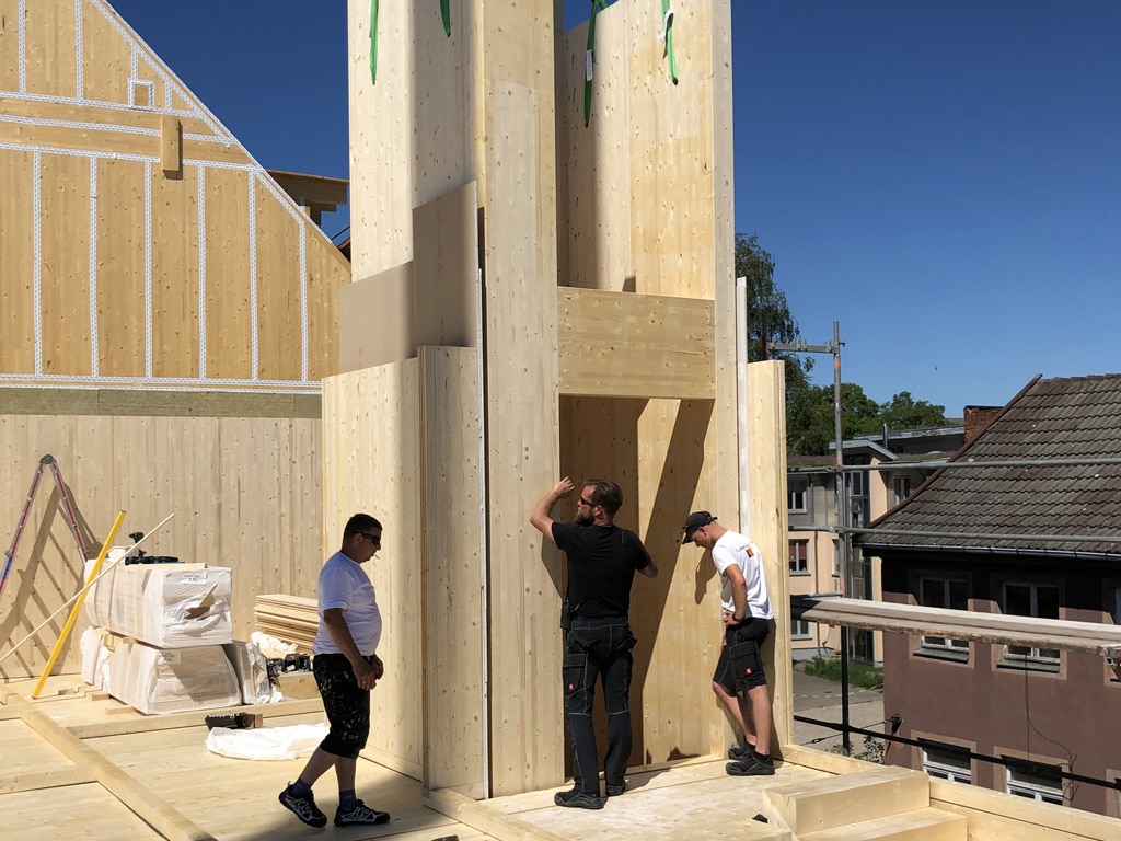 Pose éléments HBE Cage d'ascenseur en bois