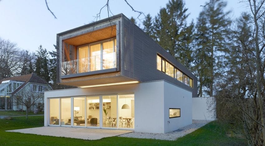 Exemple d'une construction de maison en bois moderne